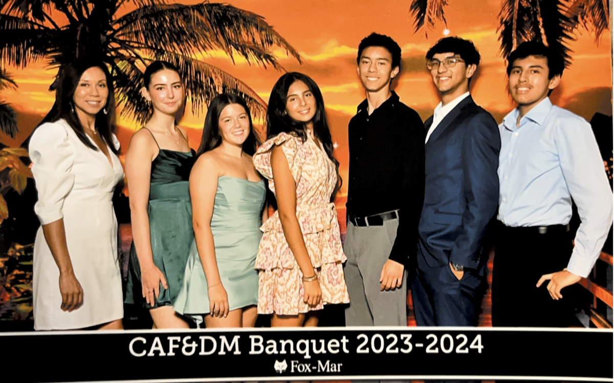 The banquet's attendees were able to receive pictures photographed and printed out by Fox-Mar as memorabilia to their experience in CAF&DM. 